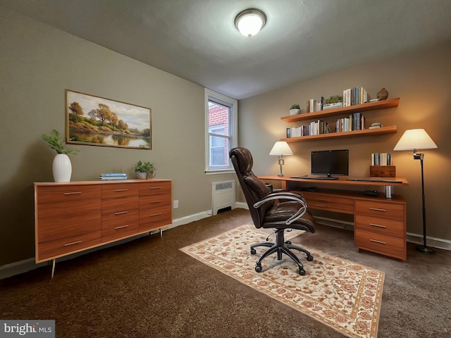 office area with radiator and dark carpet