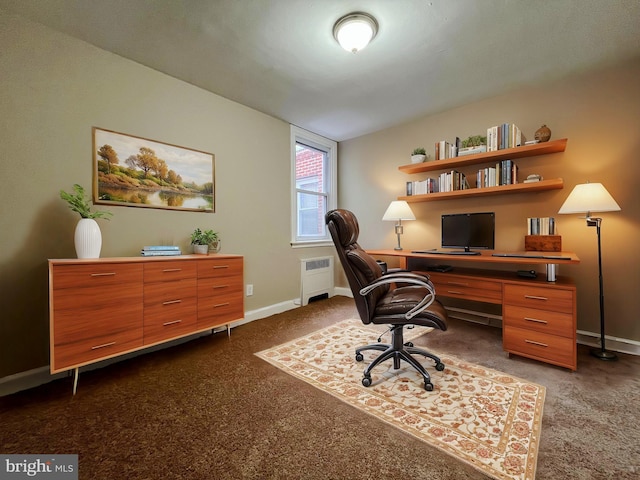 carpeted home office featuring radiator heating unit