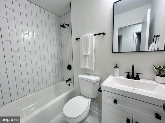 full bathroom featuring vanity, toilet, and tiled shower / bath combo