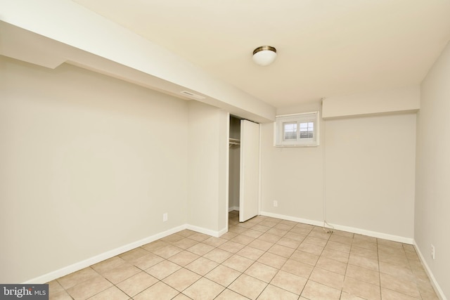 basement with light tile patterned floors