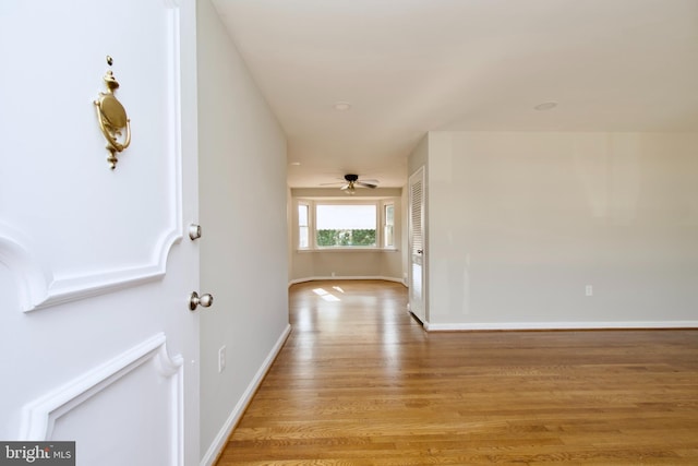 hallway featuring light wood-type flooring