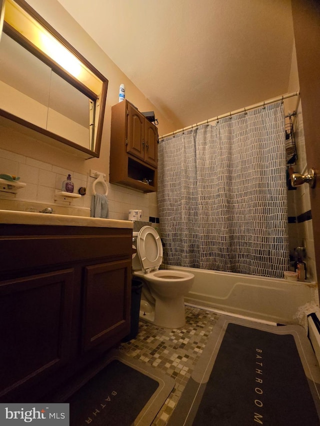 full bathroom with decorative backsplash, tile patterned flooring, vanity, toilet, and shower / bath combo with shower curtain