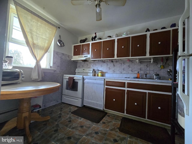 kitchen with ceiling fan, white appliances, and sink