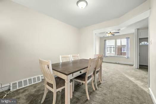 view of carpeted dining room