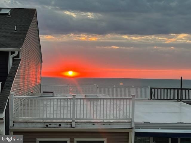 deck at dusk with a water view