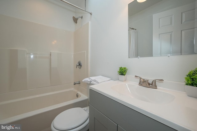 full bathroom with shower / bath combination, vanity, and toilet