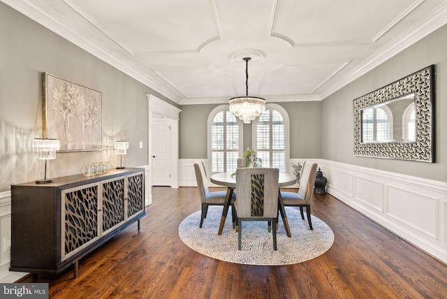 dining room featuring an inviting chandelier, crown molding, and dark wood-type flooring