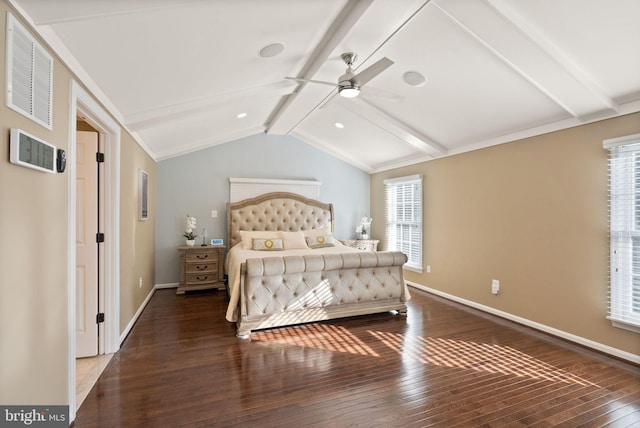 bedroom featuring ceiling fan, dark hardwood / wood-style floors, multiple windows, and vaulted ceiling with beams