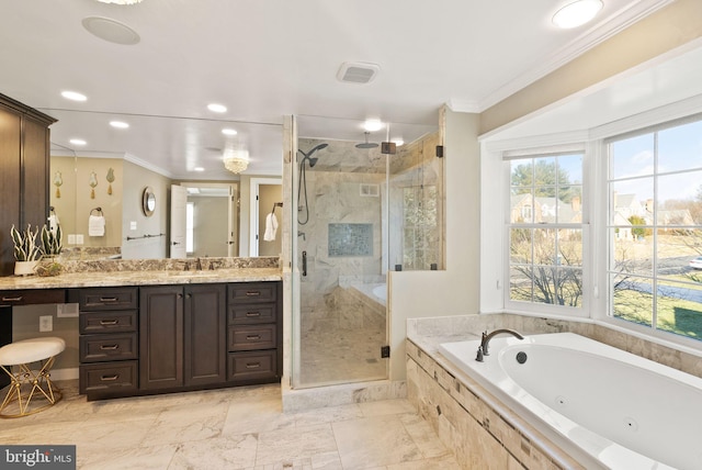 bathroom with plus walk in shower, vanity, and crown molding