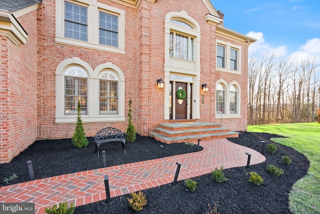 view of front of home featuring a front yard