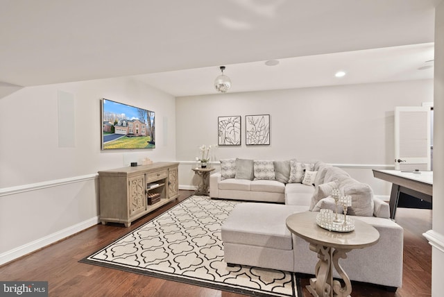 living room featuring dark hardwood / wood-style flooring