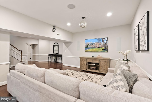 living room with dark hardwood / wood-style flooring