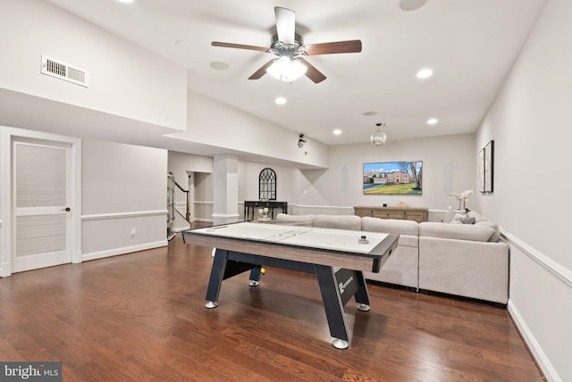 game room featuring dark hardwood / wood-style floors and ceiling fan