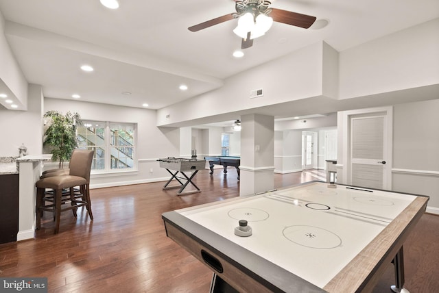 playroom featuring ceiling fan and dark hardwood / wood-style flooring