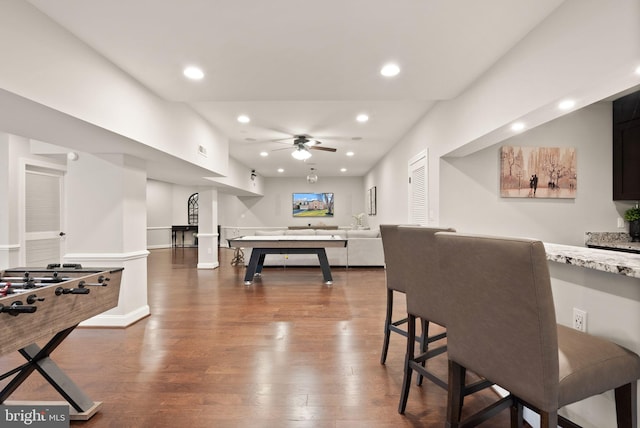 recreation room with wood-type flooring and ceiling fan