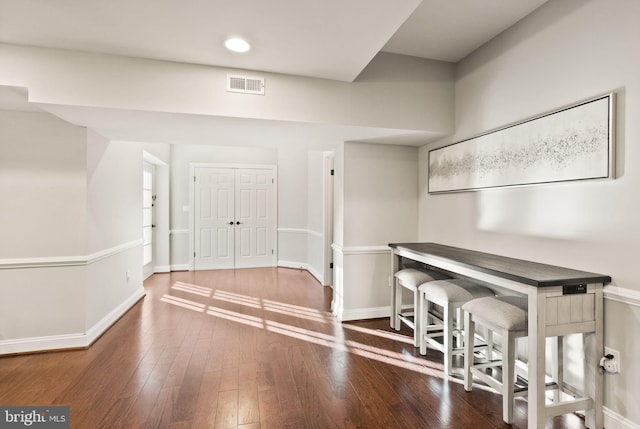 entrance foyer featuring dark hardwood / wood-style floors