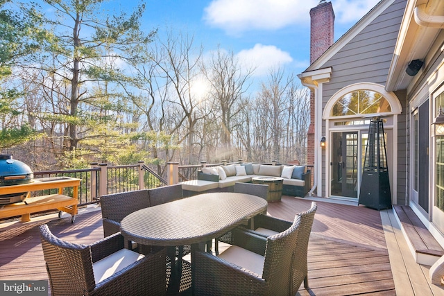 deck with an outdoor living space