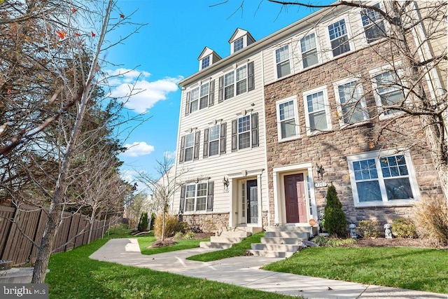 view of front of home with a front yard