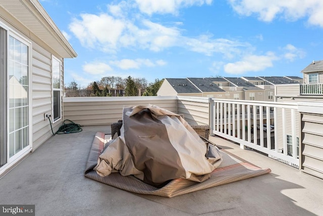 view of patio / terrace with a balcony