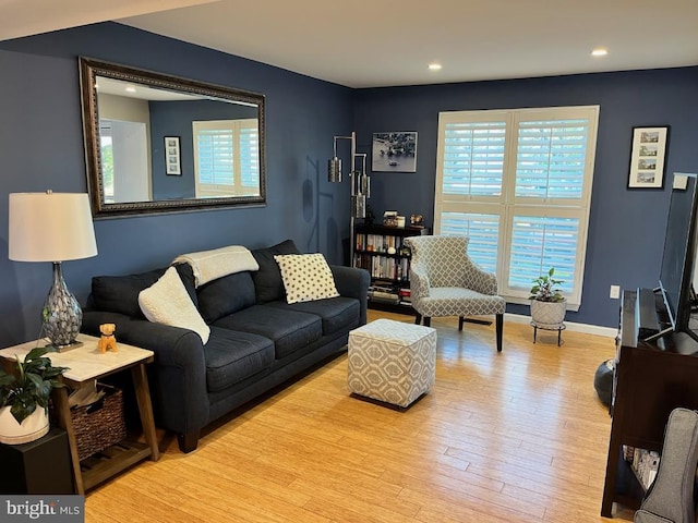12240 Nutmeg Ct, Woodbridge, VA 22192 - living area featuring recessed lighting, baseboards, wood finished floors, and a healthy amount of sunlight