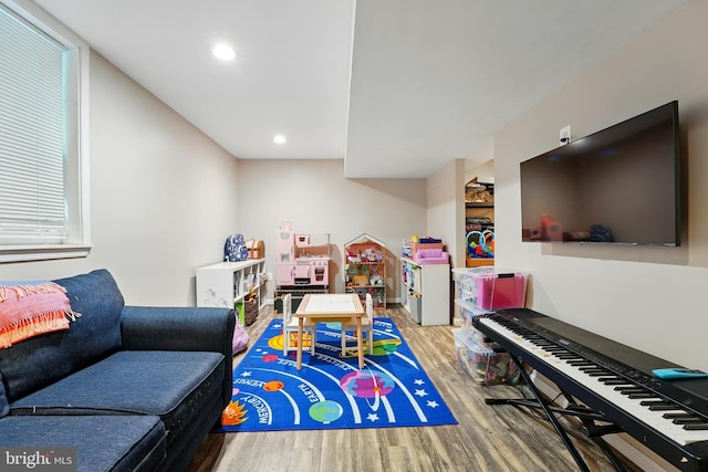 12240 Nutmeg Ct, Woodbridge, VA 22192 - recreation room featuring recessed lighting and wood finished floors