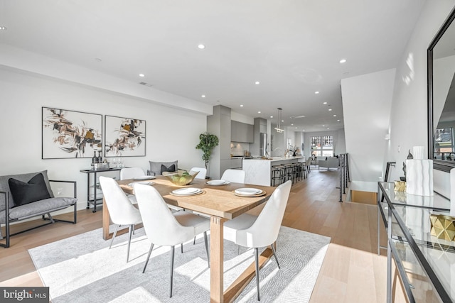 dining room featuring light hardwood / wood-style flooring