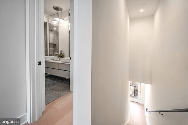 corridor with light wood-type flooring