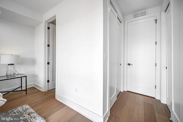 hall featuring wood-type flooring