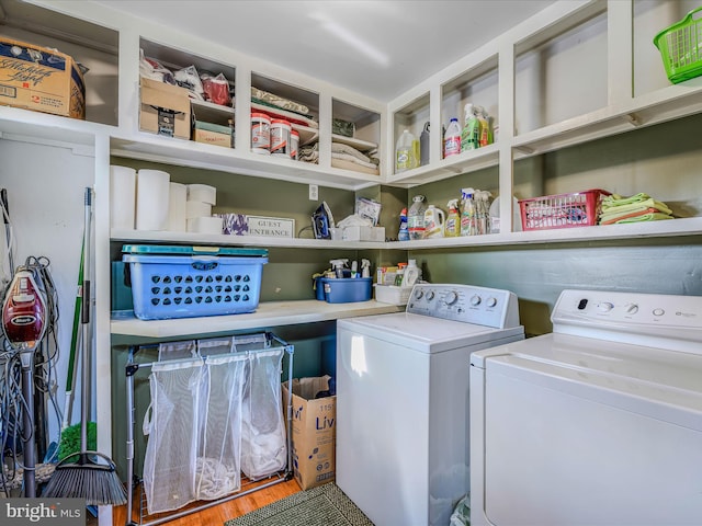 laundry area with washing machine and dryer