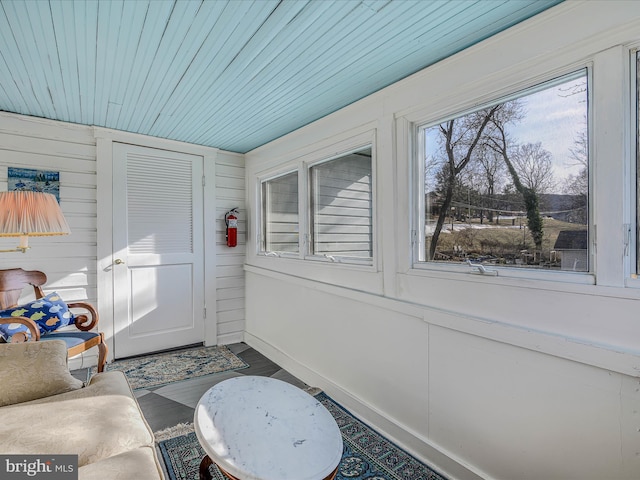 sunroom with wood ceiling