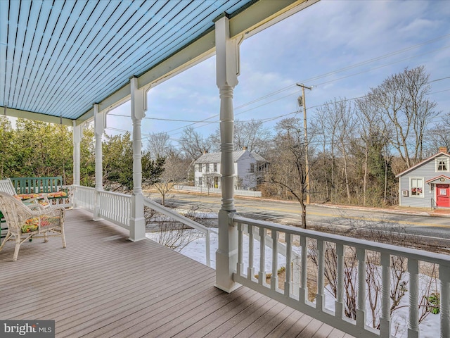 deck featuring covered porch