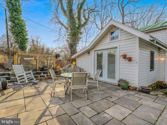 view of patio featuring french doors