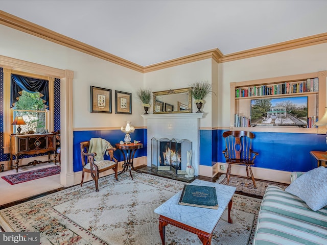 living room with ornamental molding