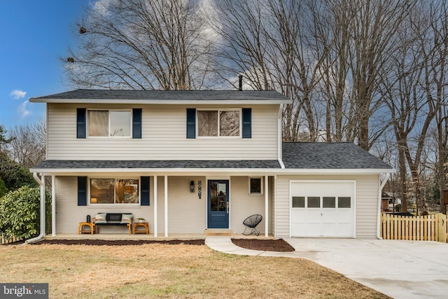 front facade with a garage, covered porch, and a front lawn