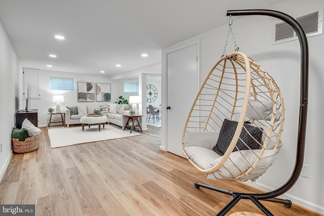 sitting room with light wood-type flooring