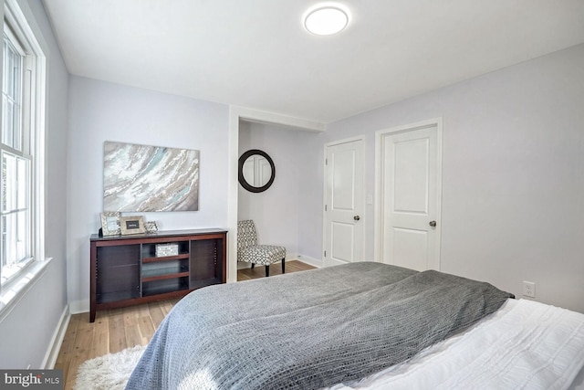 bedroom featuring hardwood / wood-style floors