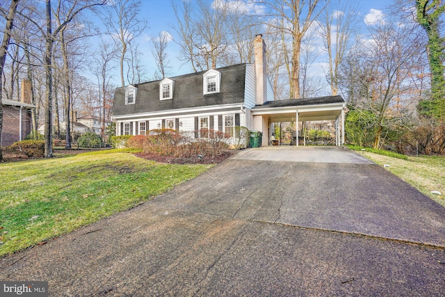 new england style home with a carport and a front lawn