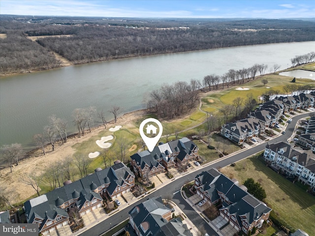 birds eye view of property featuring a residential view, a water view, and view of golf course