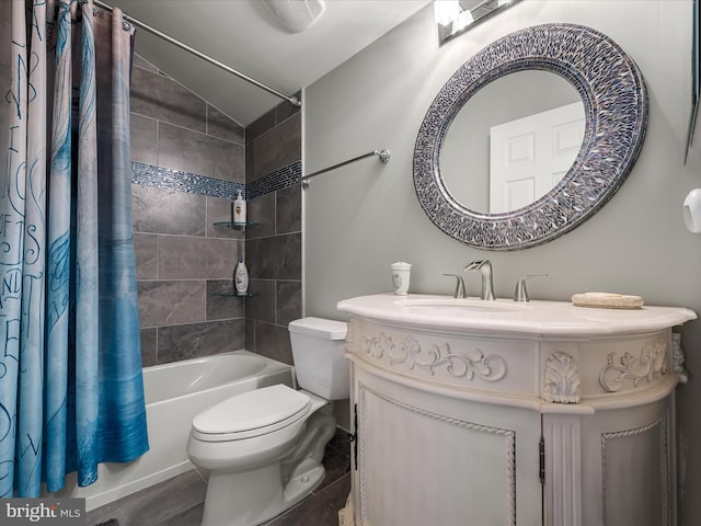 bathroom with vanity, lofted ceiling, toilet, and shower / bath combo with shower curtain