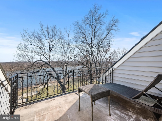 view of patio featuring a balcony