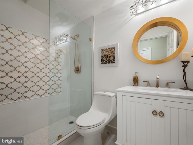 full bath featuring vanity, toilet, and a walk in shower