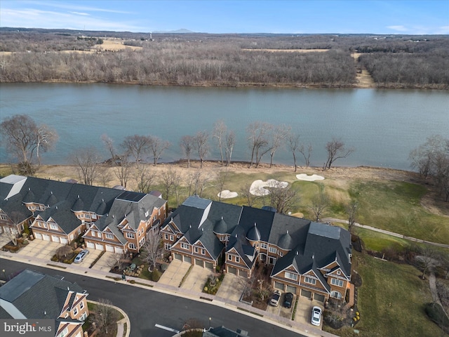 birds eye view of property with a residential view and a water view