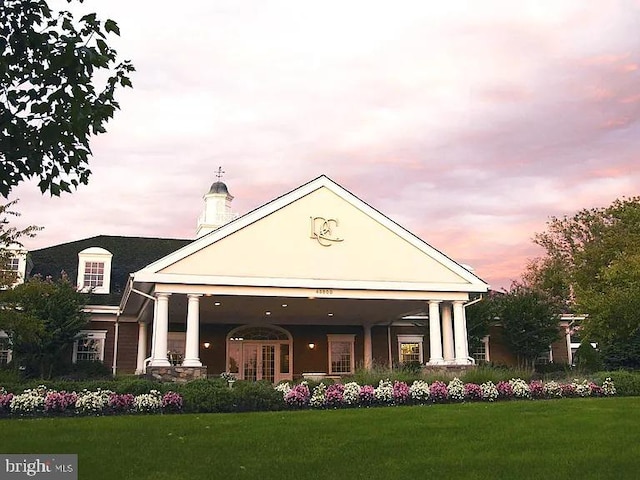 view of property at dusk