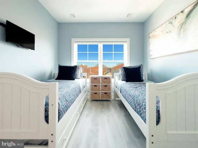 bedroom featuring hardwood / wood-style floors