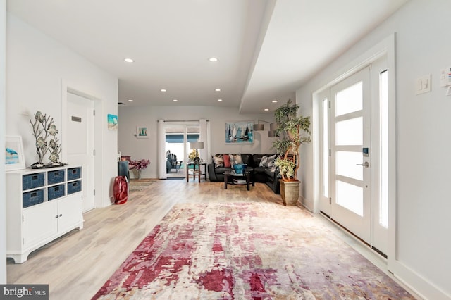 foyer entrance featuring light wood-type flooring