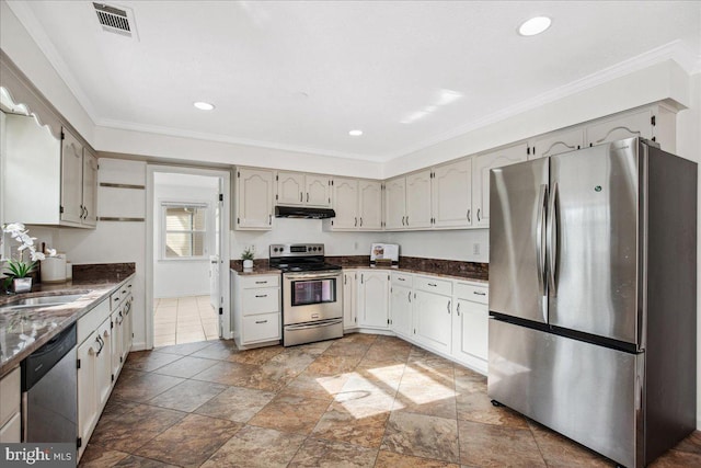 kitchen featuring ornamental molding, appliances with stainless steel finishes, and sink