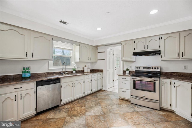 kitchen featuring sink, ornamental molding, and stainless steel appliances