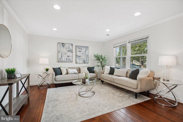 living room with dark wood-type flooring and ornamental molding