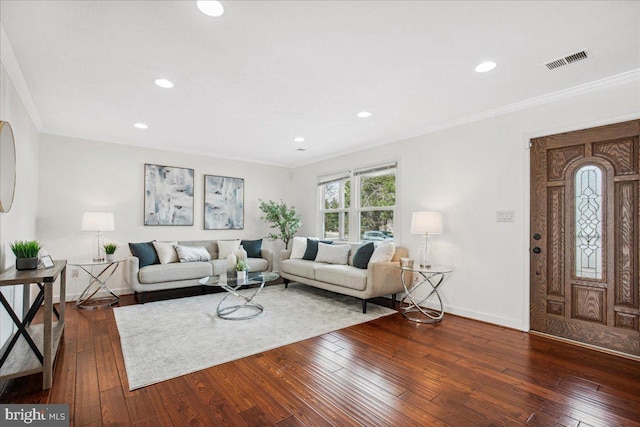 living room featuring crown molding and dark hardwood / wood-style flooring