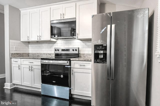 kitchen with white cabinetry, light stone countertops, backsplash, and stainless steel appliances